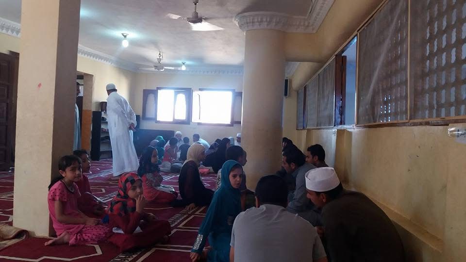 Students in mosque Quran class