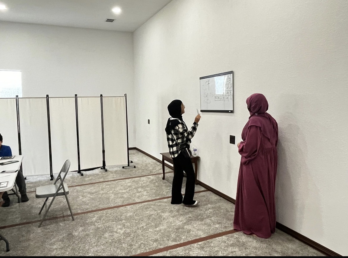 Teacher with students